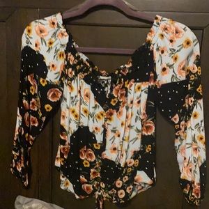 Over the shoulder tie in front blouse